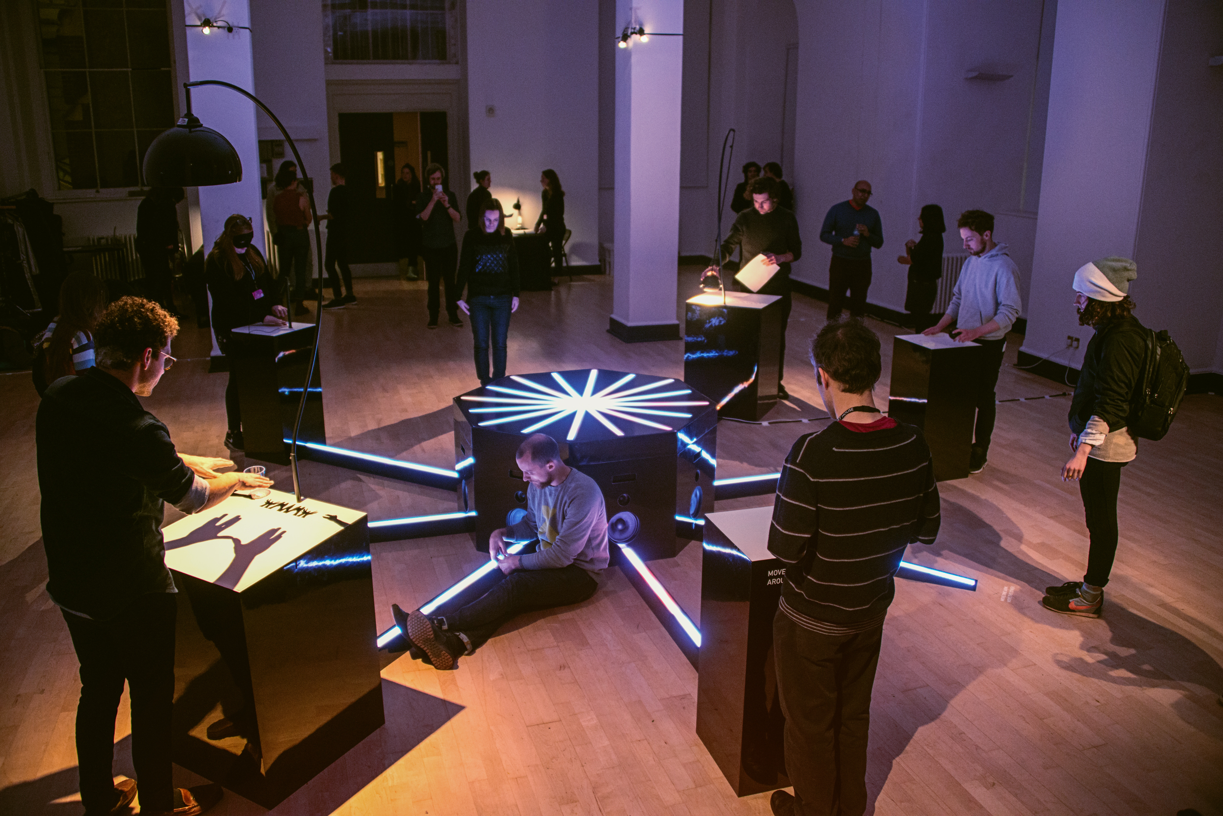 Participants collaborate to create music through bespoke instruments that use light, movement and touch, at the preview of Cave of Sounds at Music Hackspace, Somerset House Studios, Jan 2018. Photo: Suzi Corker